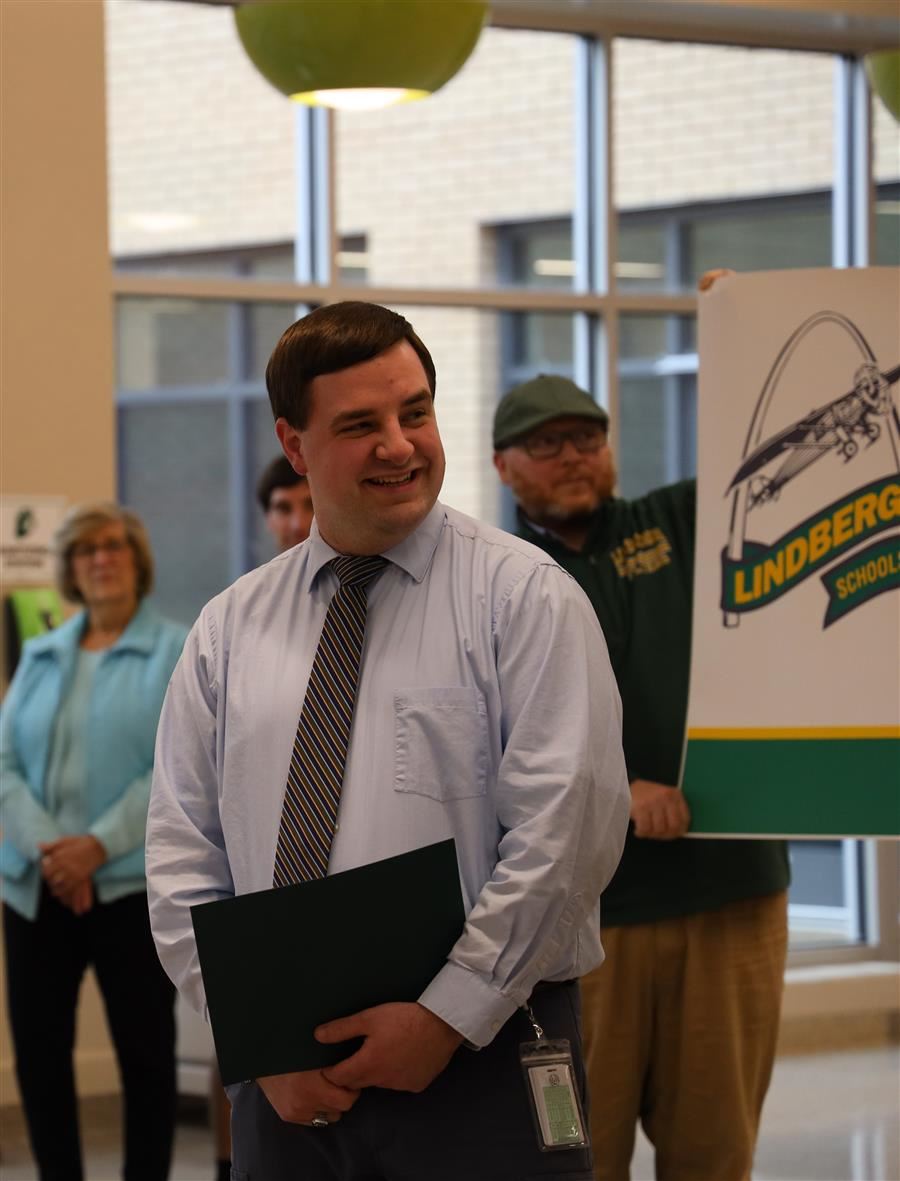 Tim Depsoki is surprised as Teacher of the Year 